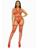 Convertible vegan leather O-ring studded harness teddy with snap-off panty, adjustable straps, and bow detail.